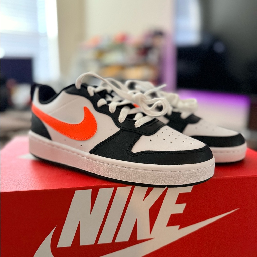 Nike Black and White Shoes with Vibrant Orange Accent 6Y / 7.5W